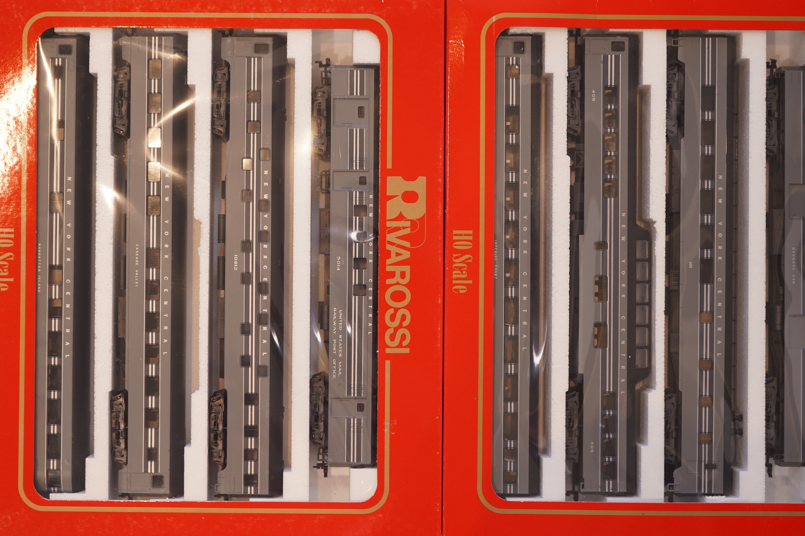 Two boxed Rivarossi 1930s New York Central Railroad coach packs; A Set (6946) and B Set (6947), both containing four coaches